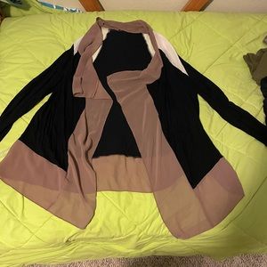 Ladies topper.  Cute over a tank top.  Sheer